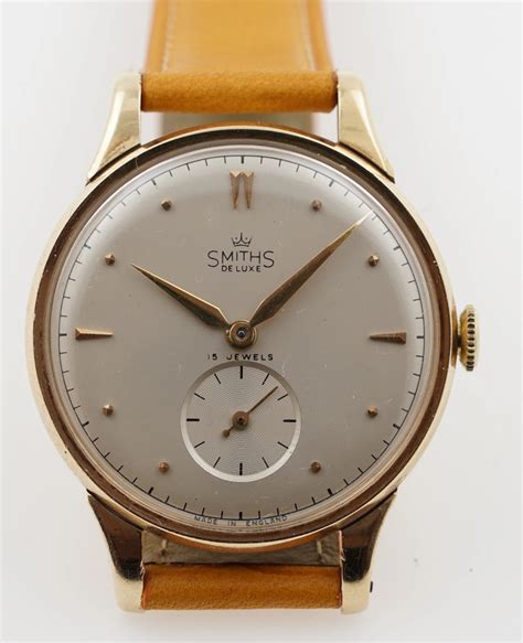 smiths deluxe gold watch